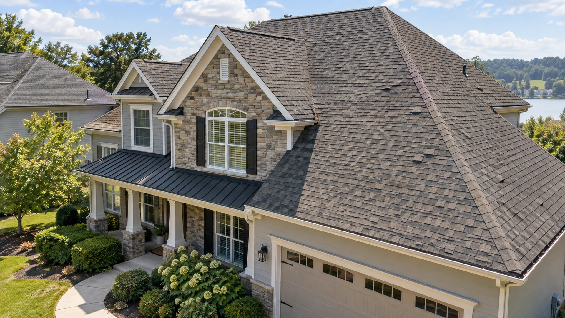 Residential home with asphalt shingle roof showing signs that may require professional inspection